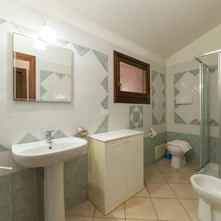 בית נופש Le Residenze Di Porto Corallo וילאפוצו