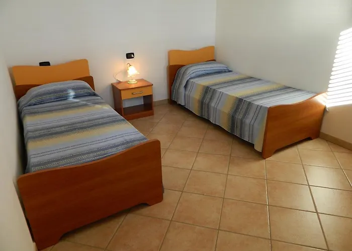 Le Residenze Di Porto Corallo Дом отдыха